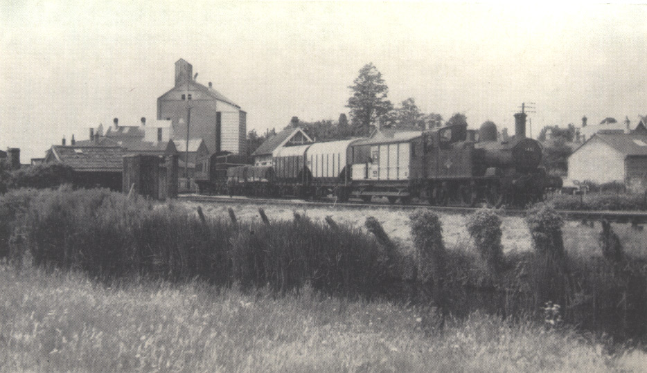 1451 with mixed train at Uffculme, running alongside the River Culm, July 1962